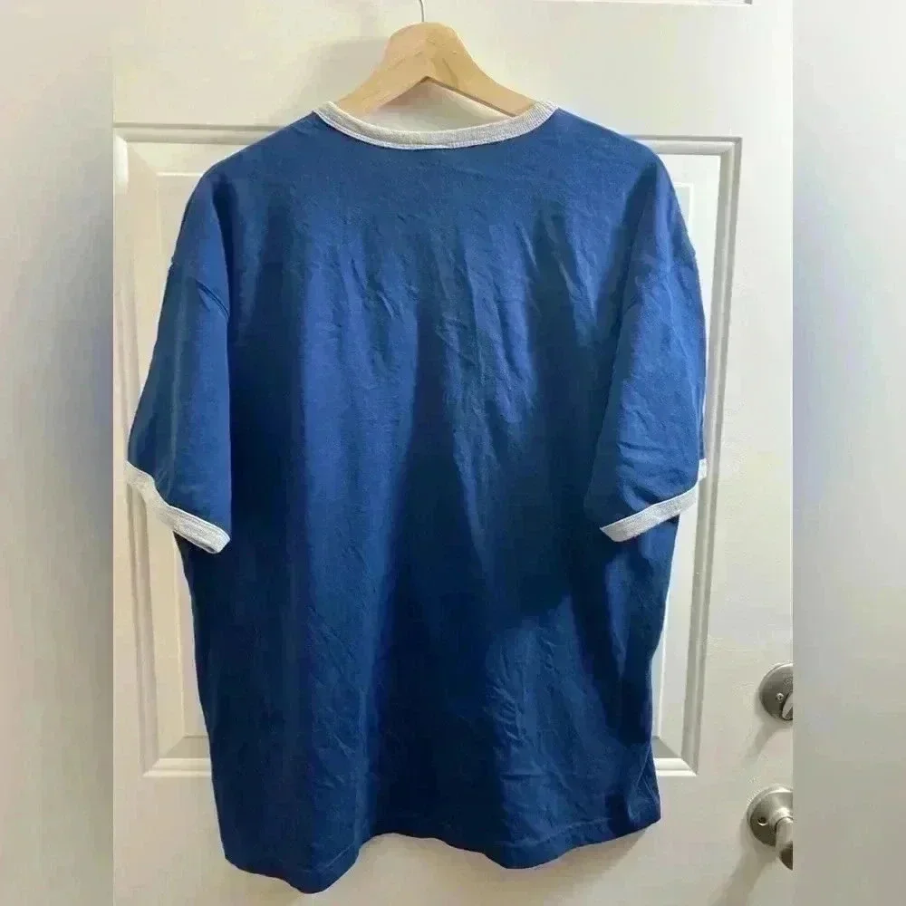 Warner Brothers Lonney Tunes T-Shirt‎ blue Large with front pocket